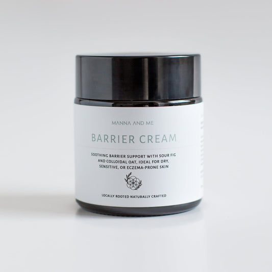 Manna and Me Barrier Cream in a glass jar, a family-safe natural skin food for soothing dry, irritated, and eczema-prone skin.
