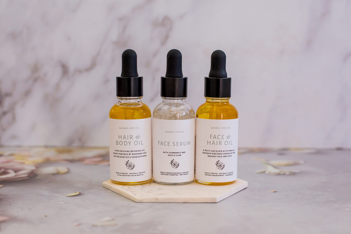 Manna and Me concentrated Face & Hair Oil dropper bottle, restorative South African botanical blend.