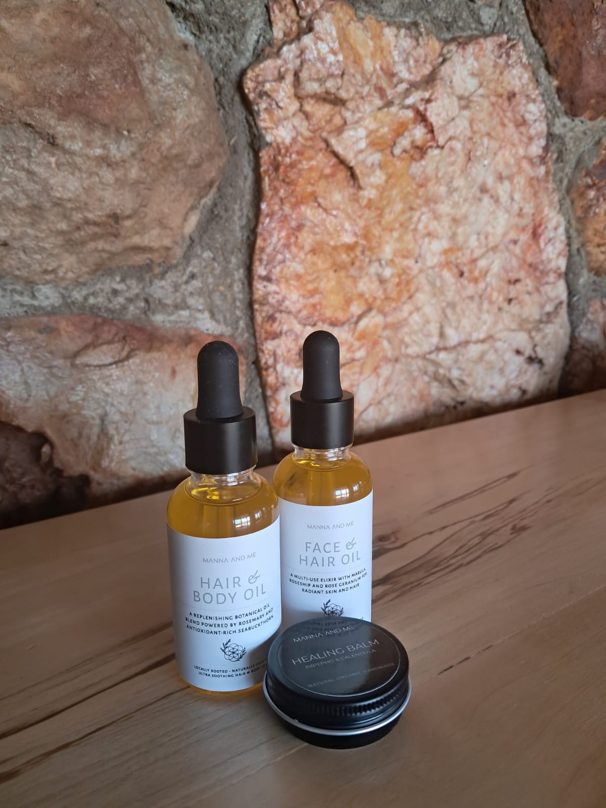 Manna and Me concentrated Face & Hair Oil dropper bottle, restorative South African botanical blend.